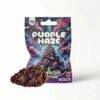 Produktfoto von der Verpackung und Inhalt von der Superior Blüten Sorte Purple Haze